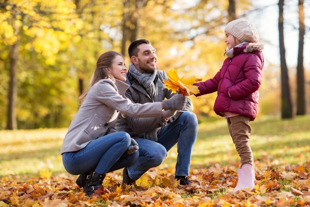 Parents Enjoying With Their Child