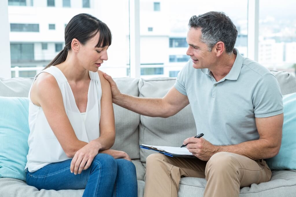 Lawyer Discussing With His Client