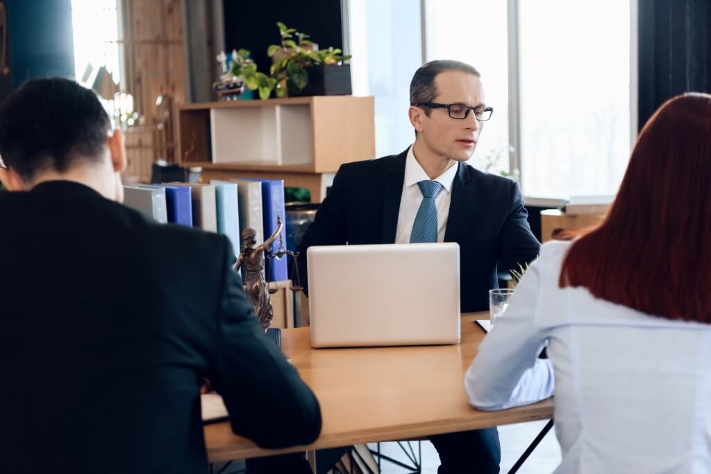 Lawyer Discussing With His Client