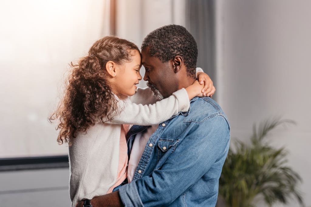 Daughter Smiling With Her Dad