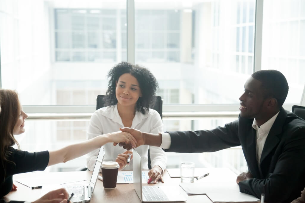 Lawyer Shaking Hands With His Client