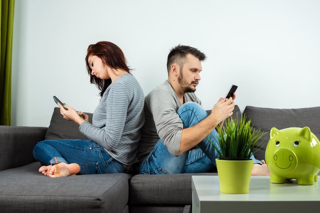 Couple Busy On Phone